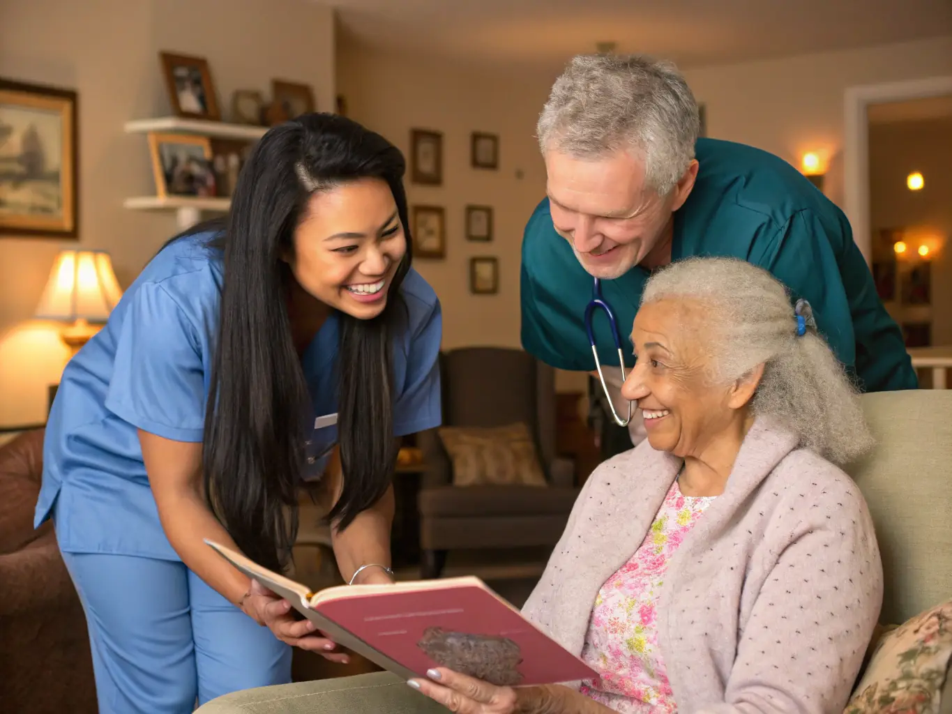 A family caregiver taking a break while a M&H Elderly Care caregiver lovingly attends to their elderly parent, showcasing the value of respite care.